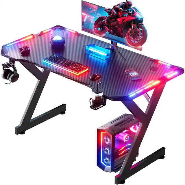 HLONONE LED Bureau Gaming 100 x 60 cm, Bureau Gamer Ergonomique avec Porte-gobelet et Crochet pour Casque, Bureaux Informatique avec Plateau en Fibre de Carbone, Table Gaming Noire
